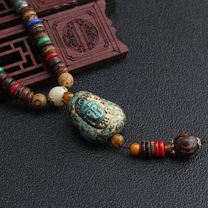 LONG PEARL PENDANT AND NECKLACE IN MALA WOOD 